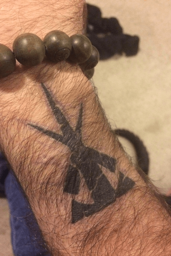Tattoo uploaded by Patrick MCcormick • Undertaker symbol one month after  wrestlemania 2017 #undertaker #wwe #wrestling • Tattoodo