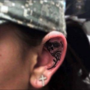 Now thats a cool tattoo #eartattoo #skull