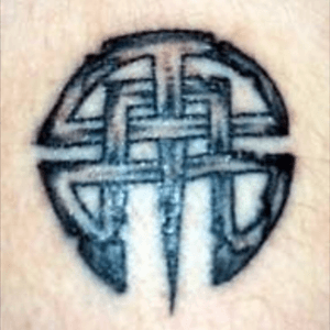 My second tattoo [2001] tnat I picked off a Flash board. It's about 1.5" in diametre. 