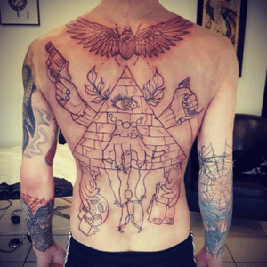 Outline done on the back, can't wait till the shading #pyramidtattoo  #allseeingeye #scarabbeetle #backtat #backtattoo 