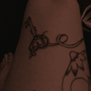 Key accent dangling off anchor ribbon with heartlock. Delicate addition. #tattoos #girlswithttattoos #tattoo #tattooedwomen #keytattoo #hearttattoo #fuckyeahlegtattoos #makingprogress 