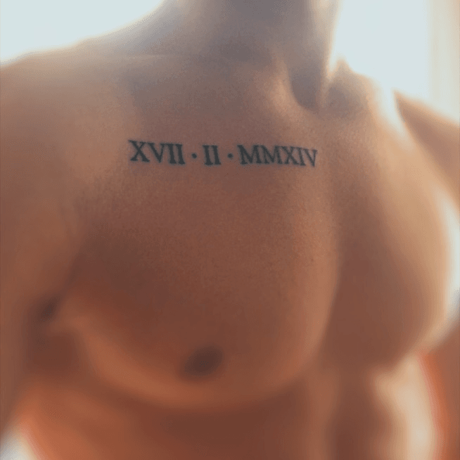 Roman Numerals Upper Chest Tattoo For Guys With Small Design  UltraCoolTattoos Tattoosformen  Small chest tattoos Chest tattoo men  Small tattoos for guys