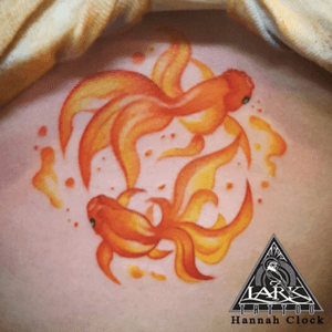 Tattoo by Lark Tattoo artist Hannah Clock.#watercolor #watercolorart #goldfish #watercolortattooing #watercolortattoo 