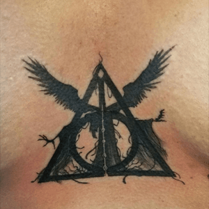Love this deathly hallows design from Sarah Miller. 