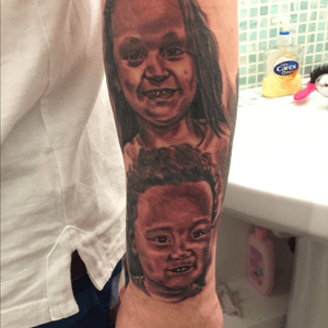 Picture of my kids tattooed to my forearm.2/3 in this picture.