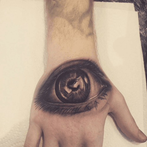 Eye hand tattoo. #hand #handtattoo #eye #eyetattoo #realistic #realism #blackandgrey 