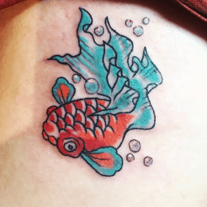 My new goldfish tattoo(fresh) by Angelo Miller at Great Lakes Tattoo's Walk Up Classic 2. 