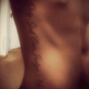 Only god can judge me, side tattoo