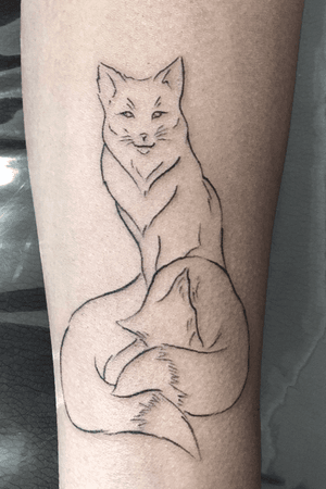 Foxes on forearm #lineworktattoo 