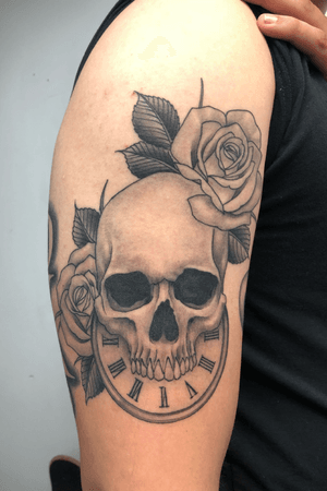 Skull and roses with clock