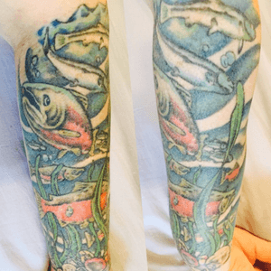 My salmon tattoo inked about 6yrs ago, showing spawning colors on salmon as well as silvers.  #salmon #underwater #fish #halfsleeve #ocean 