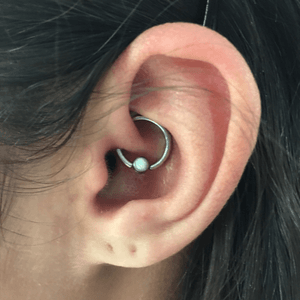 #daithpiercing i performed with a 14g captive and a 4mm white opal