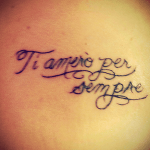 Tattoo im memorial gor my parents. It is in Italian and says Ill love you forever. 
