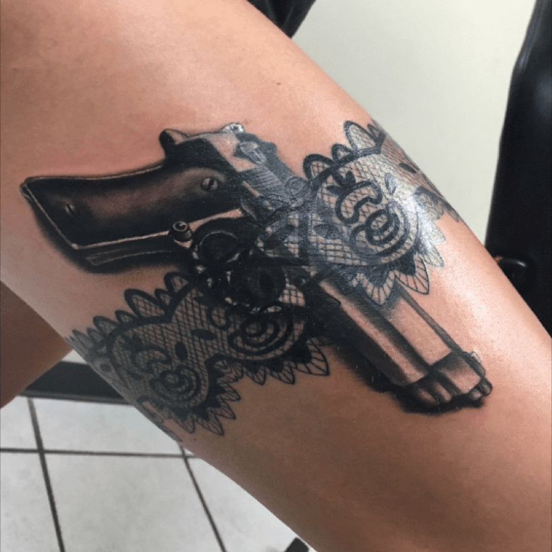 Tattoo uploaded by Isaac OrtizRiendeau  Garter tattoo with pistol garter  gartertattoo garterbelt pistol SexyTattoos lace  Tattoodo