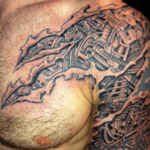 Tattoo by Lark Tattoo artist/owner Bruce Kaplan. #biomechanical #biomech #rip #skinrip #bng #bngink #bnginksociety #blackandgrey #tear #skintear #chest #arm #halfsleeve #brucekaplan #owner #artist #ownerartist #artistowner #LarkTattoo #LarkTattooWestbury #NY #BestOfLongIsland #VotedBestOfLongIsland #BestOfNYC #VotedBestOfNYC #VotedNumber1 #LongIsland #LongIslandNY #NewYork #NYC #TattoosEvenMomWouldLove  #NassauCounty #tattoo #tattoos #tat #tats #tatts #tatted #tattedup #tattoist #tattooed #tattoooftheday #inked #inkedup #ink #tattoooftheday #amazingink #bodyart
