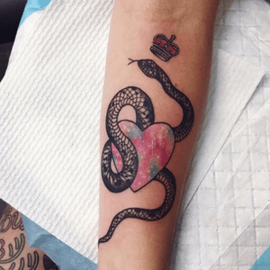 I want something like this for my little snake that just passed away, minues the crown an change the galaxy into an darker an a white snake change the position of the snake too with his name in the heart & date. Help ideas anyone? #snake #help #tattooidea #colourful 