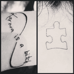 A #Autism tattoo on my neck and #karma on my hand wrist 
