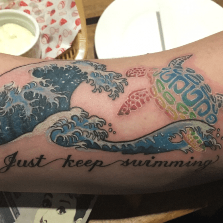 just keep swimming wave tattoo