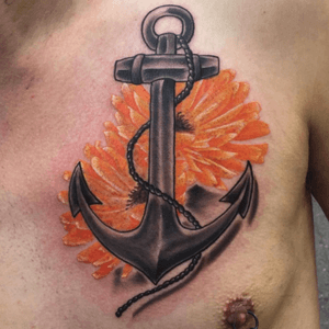 Anchor and Marigold chest tattoo. Got quite sore towards the end so the colours looks a little flared. Will get a healed shot in Sept. thanx @dannymac2389 for travelling over....look forward to the next piece ✌🏻 Proudly sponsored by @tattoolandsupplies #teamtattooland #tattoolanduk #tattoos #tattoo @worldfamousinks #ukartist @hustlebutterdeluxe @totaltattoo #creativechaos #ladytattoers #phoenixbodyart #willenhall #clairebraziertattoo