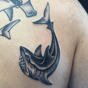 Dueling sharks. Hammerhead healed a few weeks. #tattooapprentice #anthonylowtattoos #shark #sailorjerryflash #traditionaltattooflash #flashart #tattooart #traditionaltattoo 