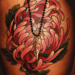 Lotus flower tattoo by Ray Jerez 