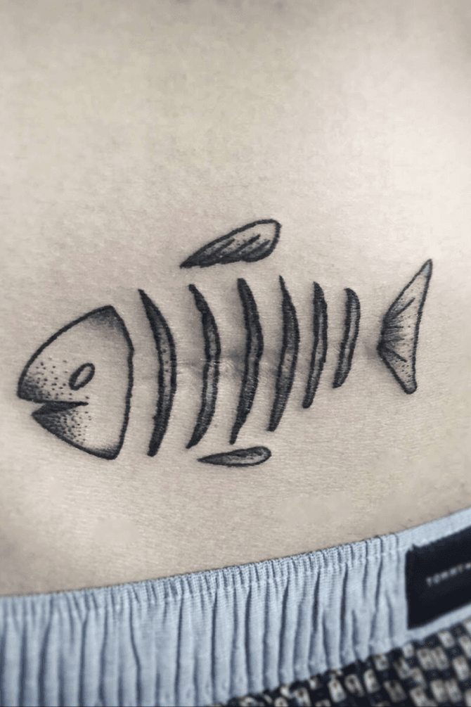 Only dead fish go with the flow tattoo on the left