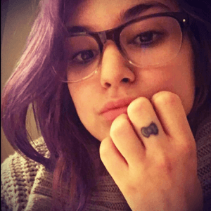 My fingers need more ink on them. #bow #ink #middlefinger #smallpleasures #smalltattoos #blueink #purplehair 