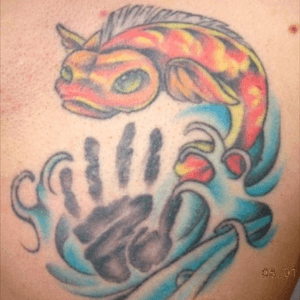 My sons handprint with a koi for protection.  His chinese element for the date he was born is water