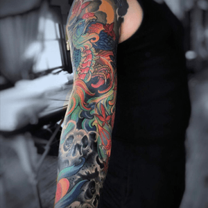 Completed this year. My Rising Phoenix  Japanese Style, coming out of the ashes leaving behind memories, death, and despair in the form of 4 skulls. Add in movement and flowing Japanese maple leaves. #solokill #speakeasycustomtattoo #ladytattooers #japanese #risingphoenix #skulls #sleevetattoo 