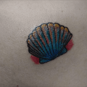 Little color shell tattoo