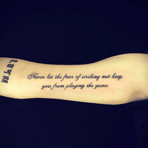 Delicate text on inner upper arm. 