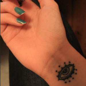 My first tattoo, done when I was 18. Did it as a warning #wrist #eye #firsttattoo #small 