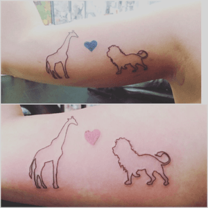 Mine and my best friends matching tattoo we got while she was visiting me in CA all the way from FL. She will always be my lion and ill always be her giraffe. She she has a blue heart because when we forst became friends i was always in blue and i have pink because she was always in pink 💙💗 #giraffe #lion #bicept #tattoo #bestfriend