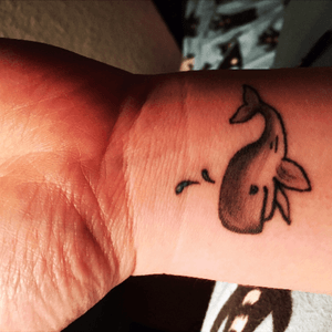 Whale on wrist/ 10 members of my family all got this inked agter taking a family vacation together and seeing a whale!  