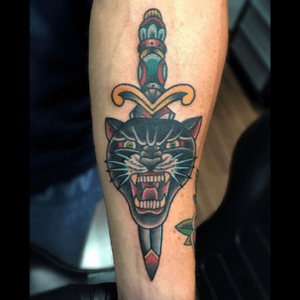A panther head and dagger combo for alex from the other week 👍🏻#lewishazlewood #lewishazlewoodtattoo #staganddaggertattoo #somerset #uk #traditional #traditionaltattoo #trad #tradtattoo #panther #pantherhead #panthertattoo #pantetheadtattoo #traditionalpanther #dagger #daggertattoo #traditionaldagger #daggerthroughtattoo 
