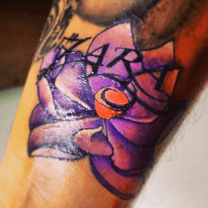 Added this the same month my baby girl Zara was born.She is just a princess with lots of love. #purple #flower #cherrieblossoms #lilly #color #fresh #inked #zara #princess #wrist #painfullpleasure 