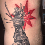 Samurai tattoo on right side of ribs 