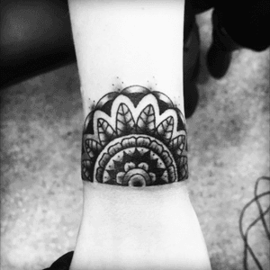 Half Mandala Cuff tattooed and designed by Andrew Hauck #mandala #wristtattoo #ouch #mandalacuff #cufftattoo #blackandgreytattoo 