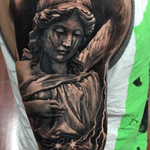 Awesome piece by #maydaytattooco artist #garrettharper #angel #statue #arm #blackandgrey 