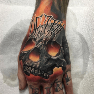 custom piece designed and tattooed on my brother  @hobotattoo referenced from @intothefirejewelry some of the coolest rings #tattoo #skulltattoo #deathtattoo #firetattoo #uktta #besthandtattoos #tattooist #realismtattoo #colorrealism #handjob @tattoodo #skull #skulltattoo 