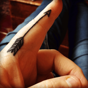 My #arrow representing decision to move forward in spite of adversity. The tailfeather is my family, keeping me aloft and holding me straight. #family #finger #arrow #fingerarrow 