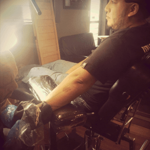 Getting an arrow done on my forearm, representing defense and protection from harm.