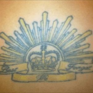 This tattoo i got five years ago done on christmas eve of all days!   I got the rasing sun to show my respect for my grandfathers who fought in WW1 and WW2. 