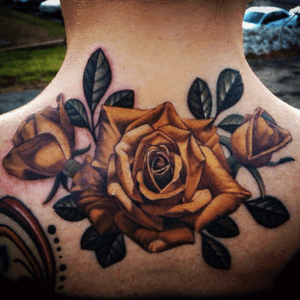 Realistic yellow roses done by Orville in Kansas City.