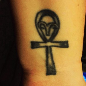 The zodiac symbol for Aries and the egyptian Ankh... As a reminder of someone special who ill always remember in my life.