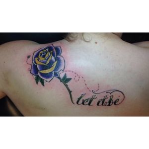 This one I got done in Late October, my boyfriend I had just broken up and we were together for a little over two years. What is the relationship that basically taught me that I need to respect and stand up for myself more and that made me think of my grandma passed away when I was in middle school. Her name is Roseanne hence the Rose, her favorite song was Let it be, and her favorite color was purple. What was really cool about this tattoo was that I had the bee originally in the sketch, so when the whole thing was done my artist suggested the dots that tie-into the letters and I absolutely loved it it was perfect. #rose #purplerose #yellow #quote #bee 