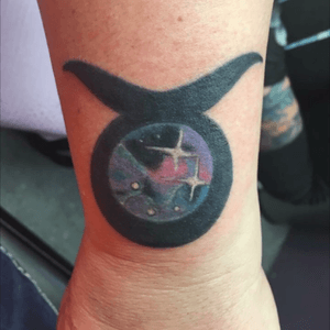 Taurus symbol finished by Lacey at Wasatch Tattoo Company in Heber City Utah 