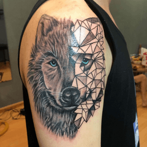 Grey wolf tattoo