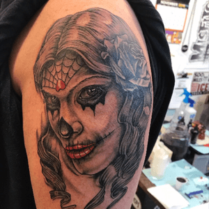 New to the community. This is my day of the dead girl tattoo in honor of a past someone. Thanks for having me. Any good ideas for turning this into a half sleeve welcome