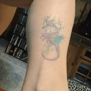 My fisrt tattoo, circa 1990. Going to be reworked in September. 